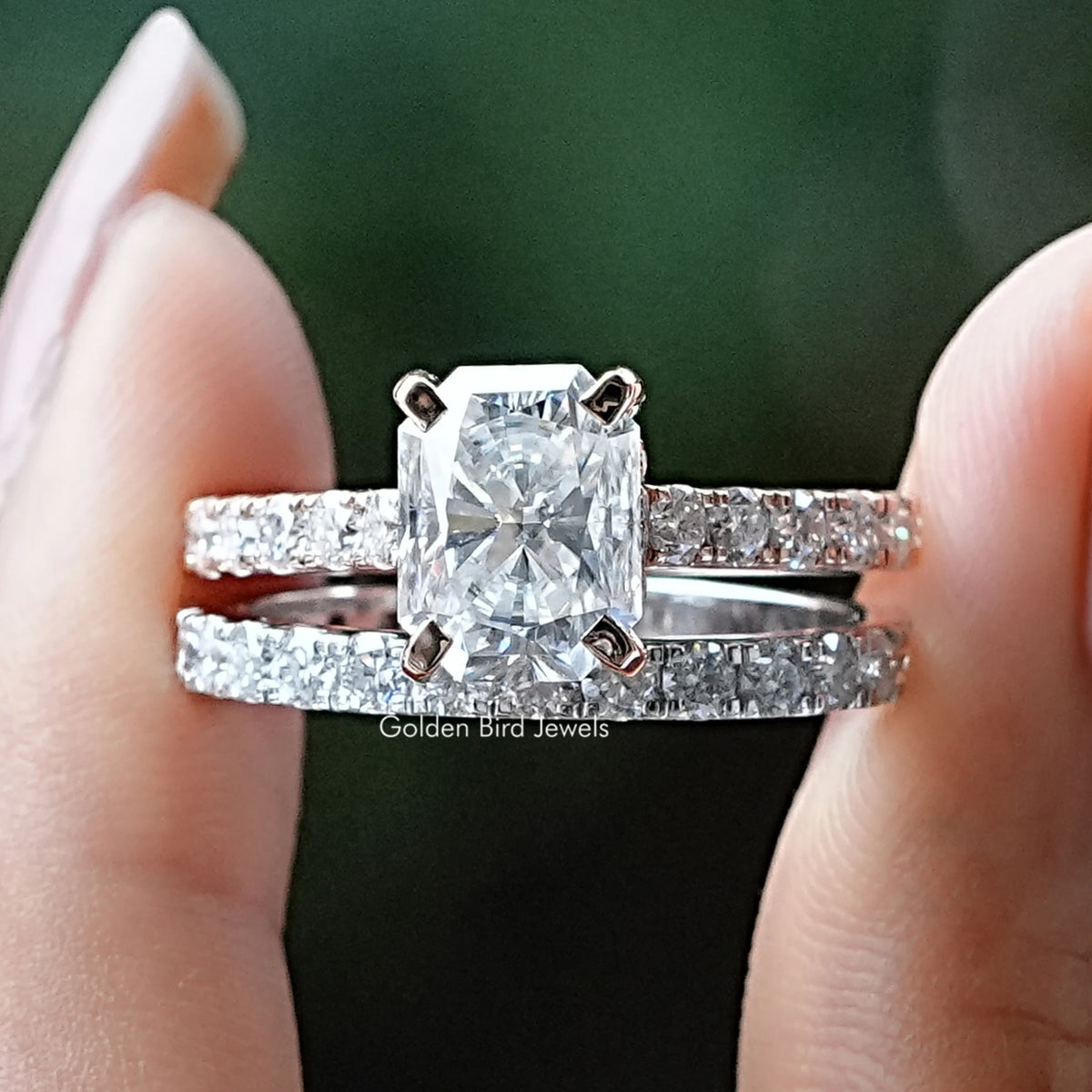 Bridal ring set with large round center stone and two sparkling side bands