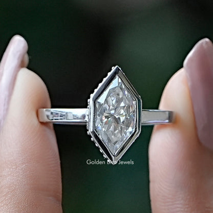Marquise-cut moissanite engagement ring with clear center stone, hidden halo, silver band