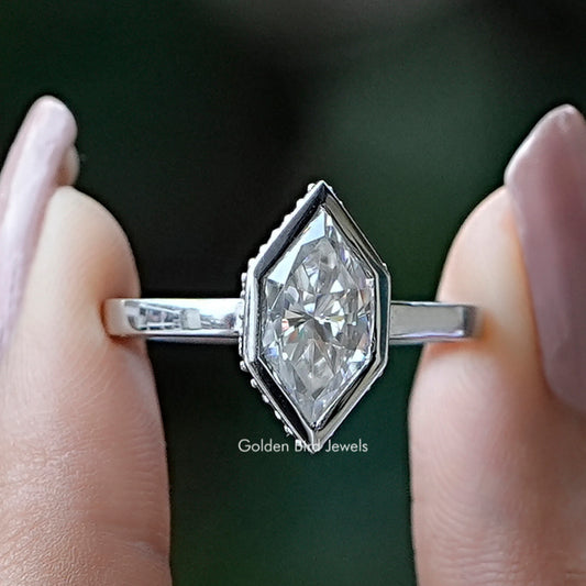Marquise-cut moissanite engagement ring with clear center stone, hidden halo, silver band