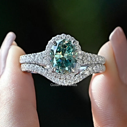 Oval moissanite bridal ring set with pavé band in silver tone