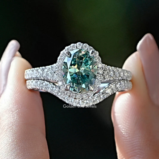 Oval moissanite bridal ring set with pavé band in silver tone