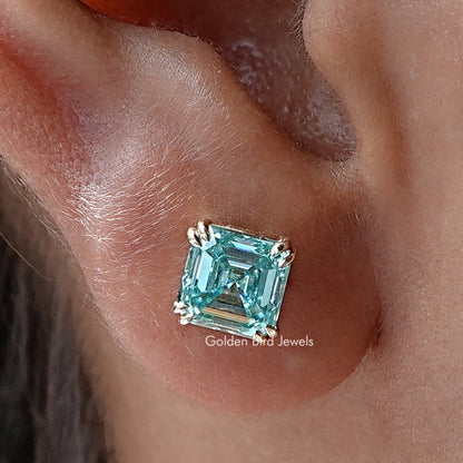 Asscher-cut blue moissanite solitaire stud earrings with silver prongs