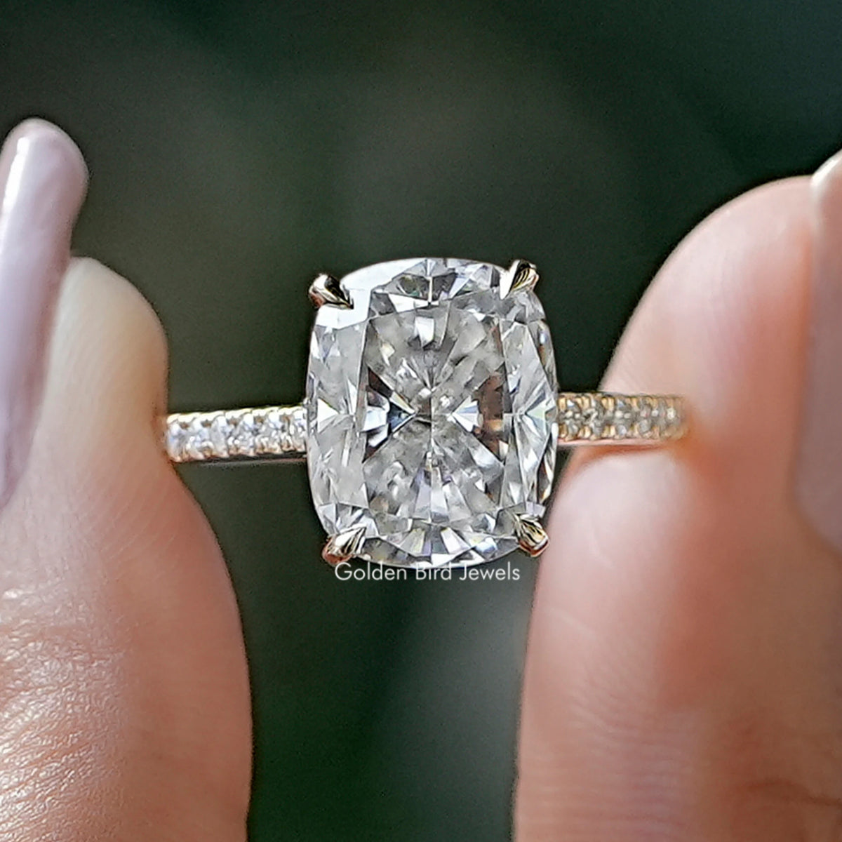Cushion-cut moissanite ring with hidden halo, prong-set center and pavé band