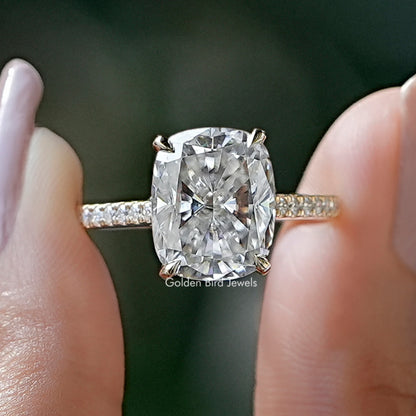 Cushion-cut moissanite ring with hidden halo, prong-set center and pavé band