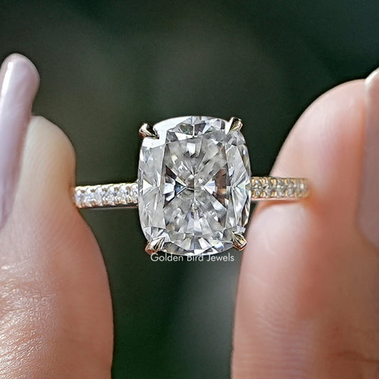 Cushion-cut moissanite ring with hidden halo, prong-set center and pavé band