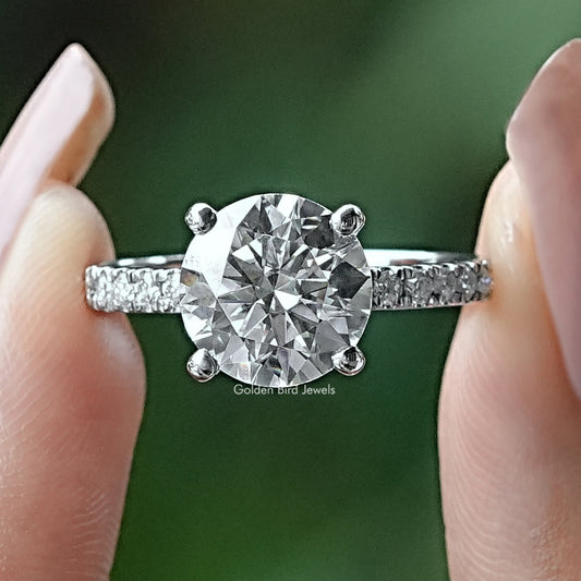 Sterling silver round moissanite solitaire ring with four side accent stones
