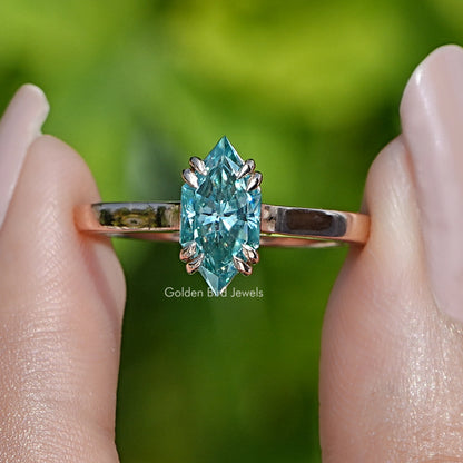 Blue marquise-cut moissanite solitaire ring with rose-gold band