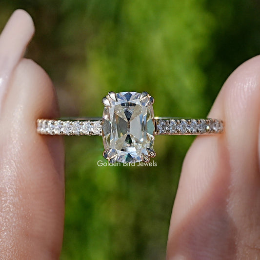 Moissanite ring with elongated cushion-cut center stone and pavé band