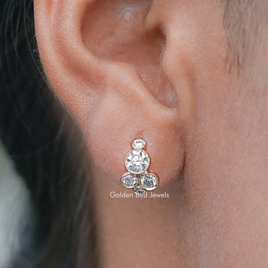 Gold-tone huggie earrings with round lab-grown diamond clusters
