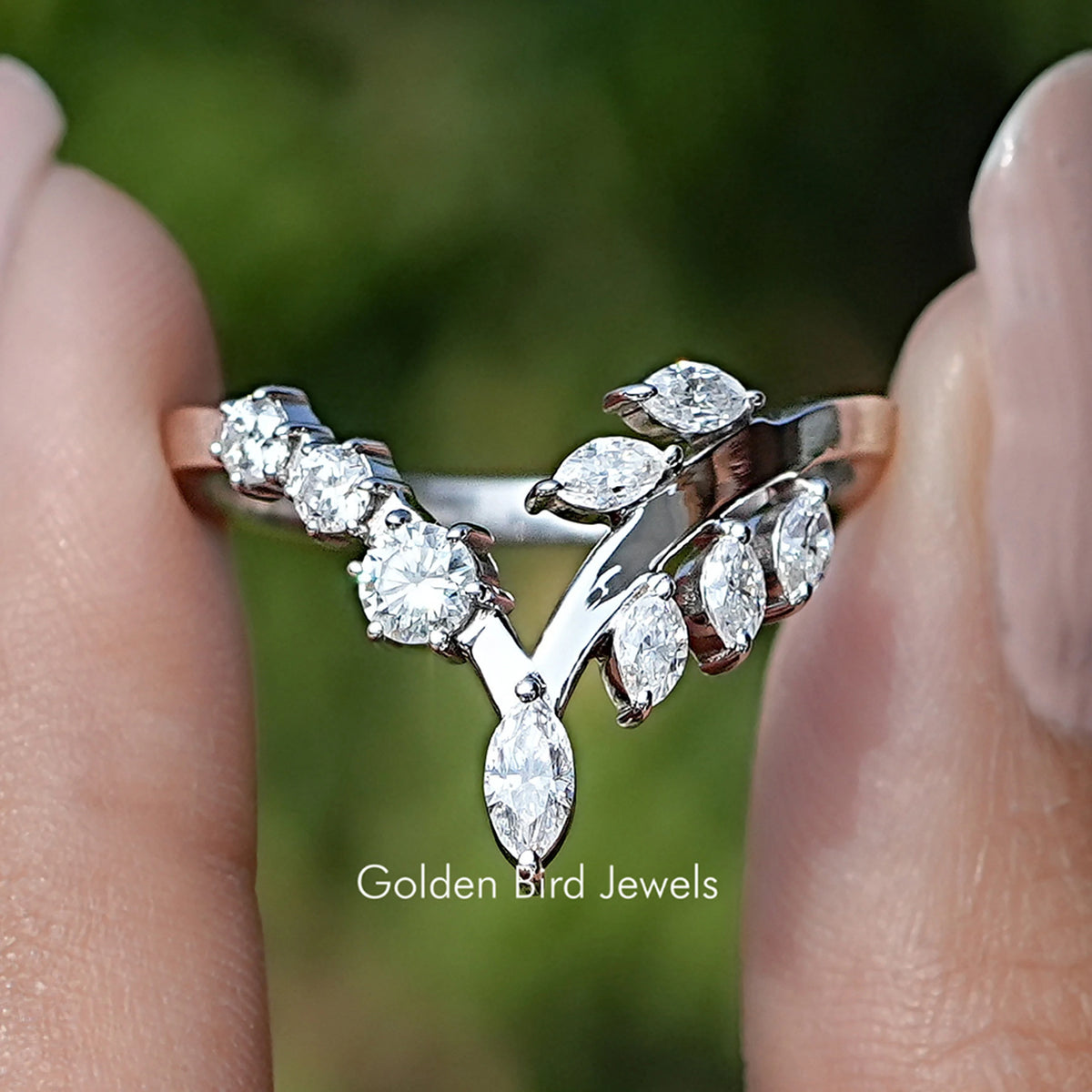 Moissanite marquise-cut V wedding band, curved setting detail