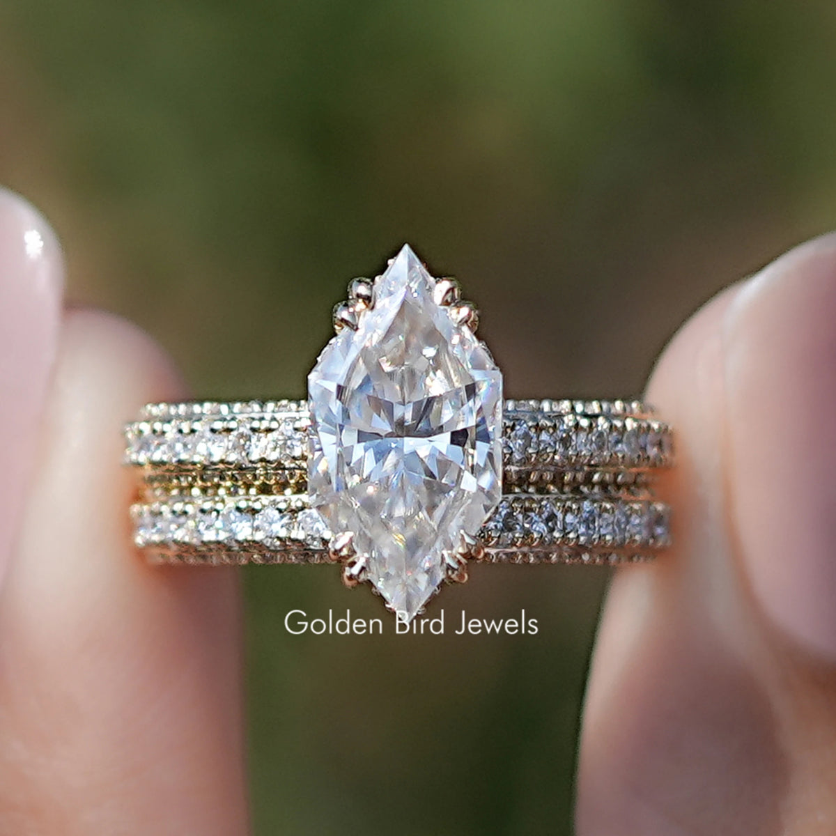 Marquise moissanite bridal ring set with pavé bands