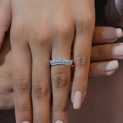 Curved double-row eternity band ring with round clear stones on silver-tone band