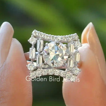 Square moissanite ring with silver prong setting and baguette side stones