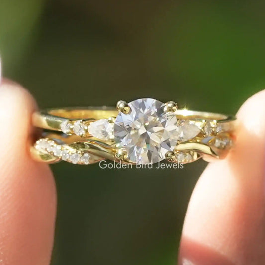 Gold bridal ring set with round center lab diamond and side stone accents
