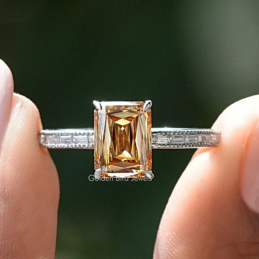 Criss-cut moissanite wedding ring with square center stone and baguette side stones
