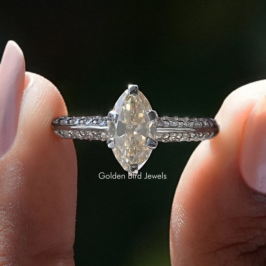 Oval-cut moissanite accent ring with pavé band