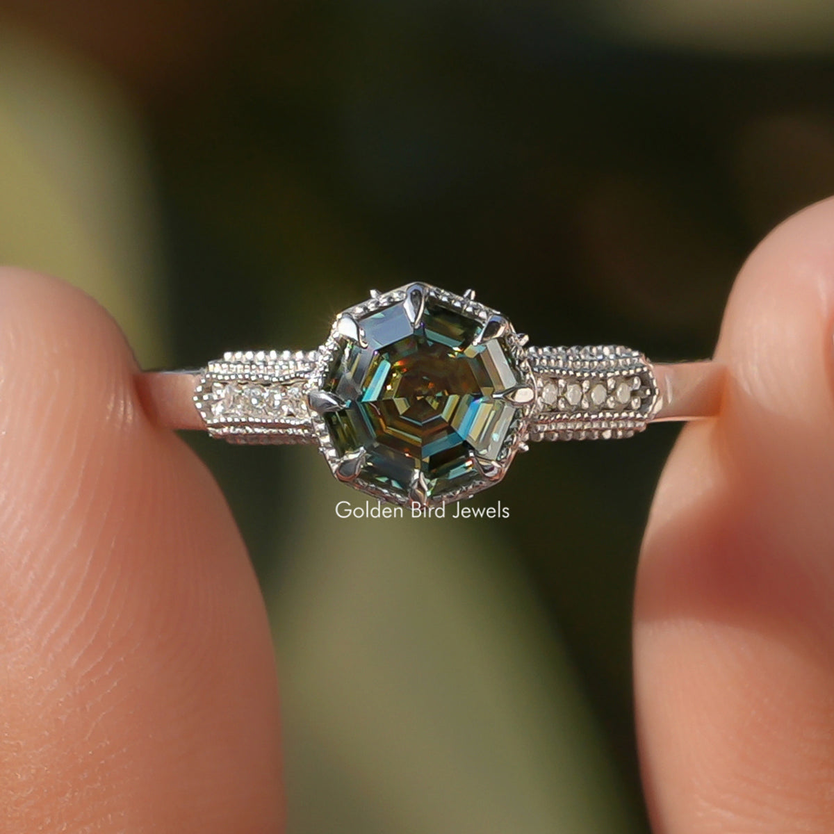 Step-cut octagon moissanite accent ring with milgrain band