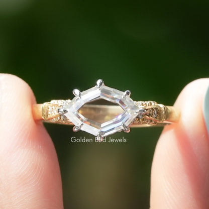 Marquise moissanite ring with hidden halo and engraved gold band