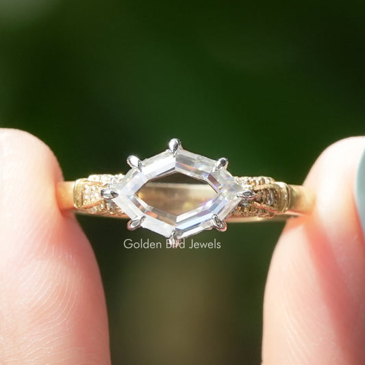 Marquise moissanite ring with hidden halo and engraved gold band