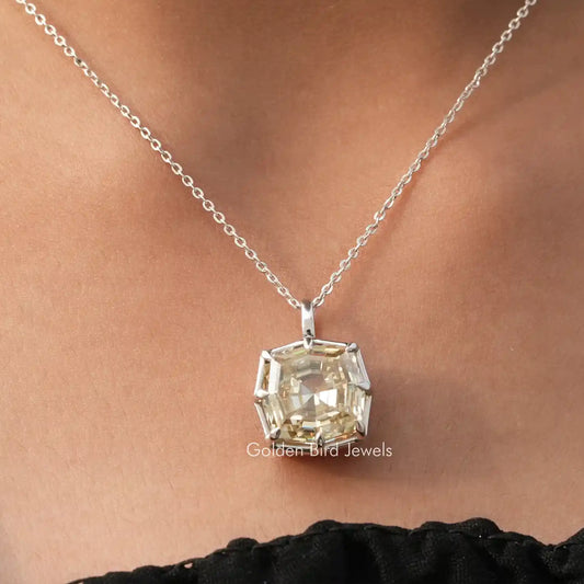 Cushion-cut moissanite solitaire pendant with step-cut setting on silver chain