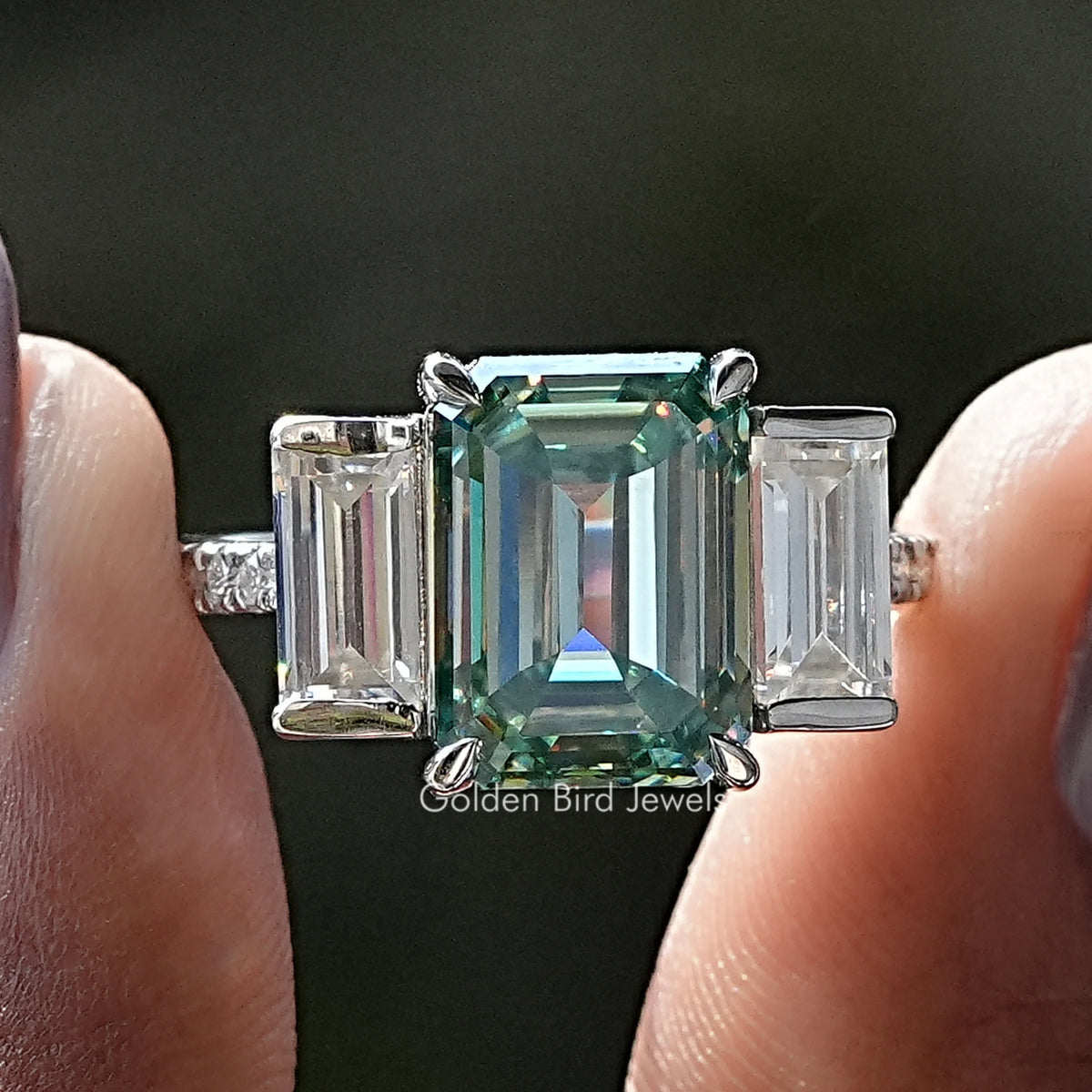 Three-stone emerald-cut moissanite ring, silver with large center square stone