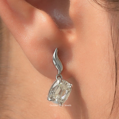 Silver dangle earrings with cushion-cut moissanite stone and curved hook drops