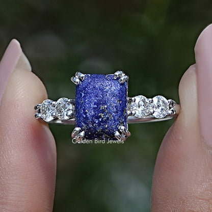 Blue square emerald-cut gemstone engagement ring with side round stones in silver
