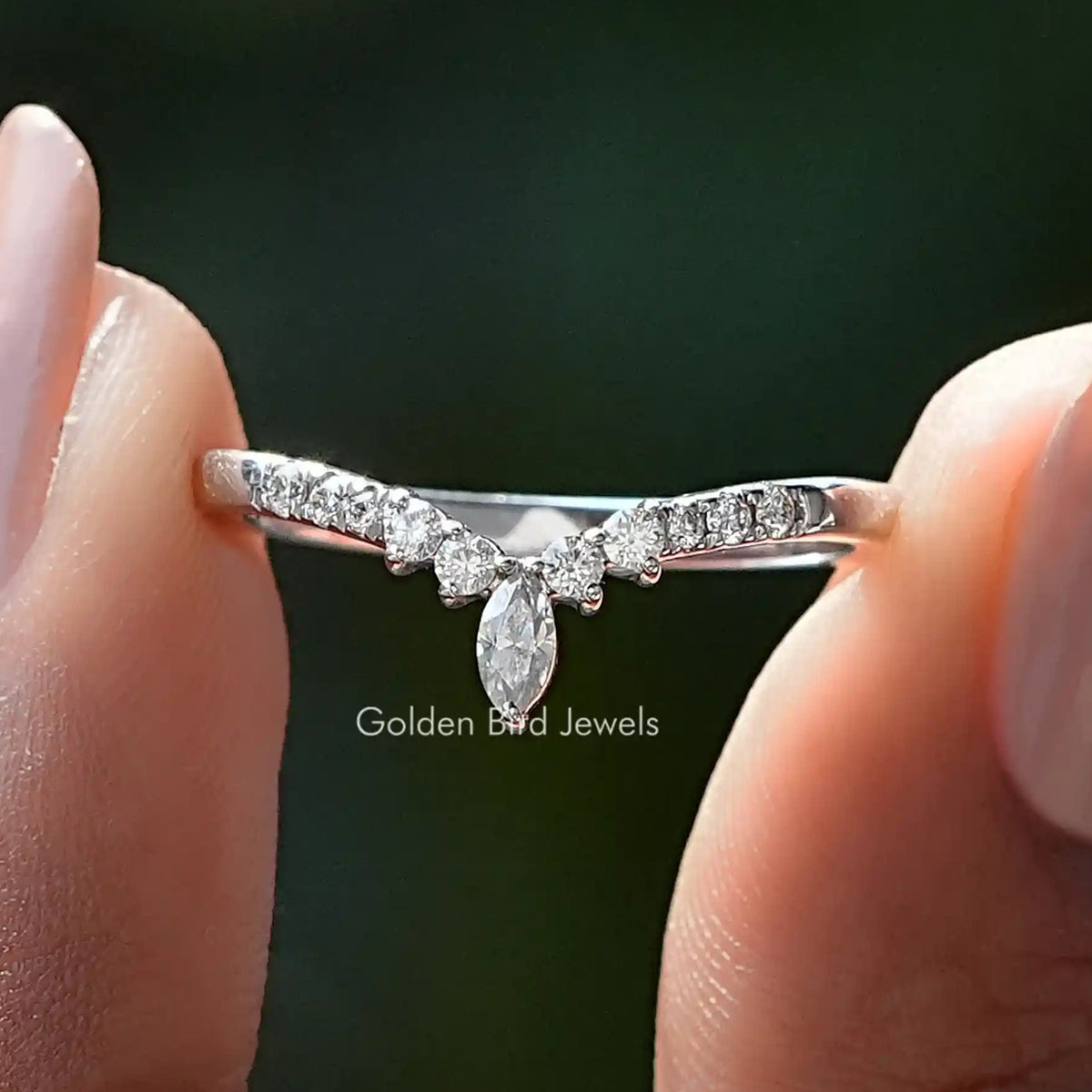 Silver marquise-cut moissanite wedding band with clustered side stones, stackable style