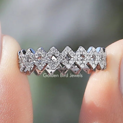 Moissanite zigzag band ring with round stones on a silver band