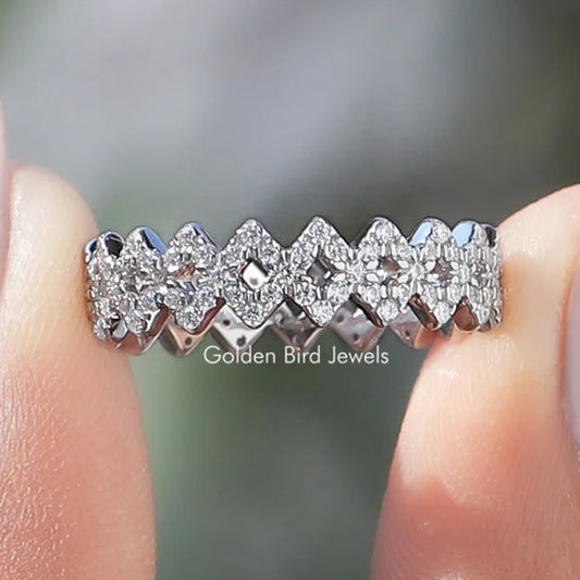 Moissanite zigzag band ring with round stones on a silver band