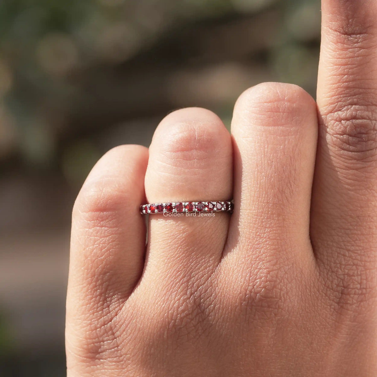 View of Round Cut Moissanite Eternity Band in prongs setting