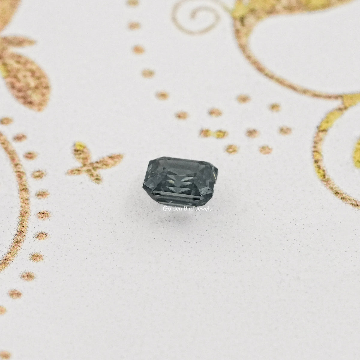 Gray Asscher-cut moissanite gemstone, loose single stone shown centered