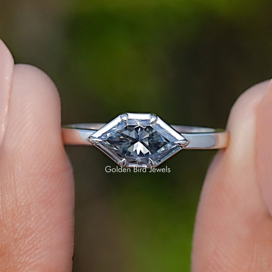 Marquise-cut gray moissanite solitaire ring with silver band and four-prong setting