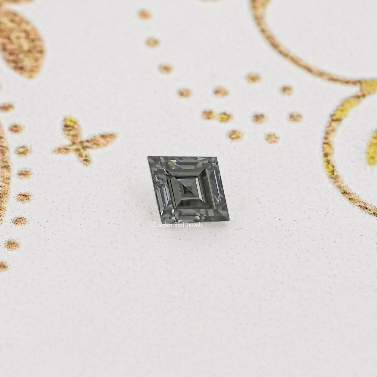 Gray moissanite step-faceted loose stone, front view.