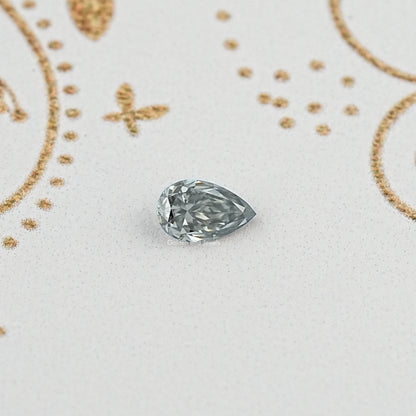 Top View of pear cut moissanite stone capturing the brilliance