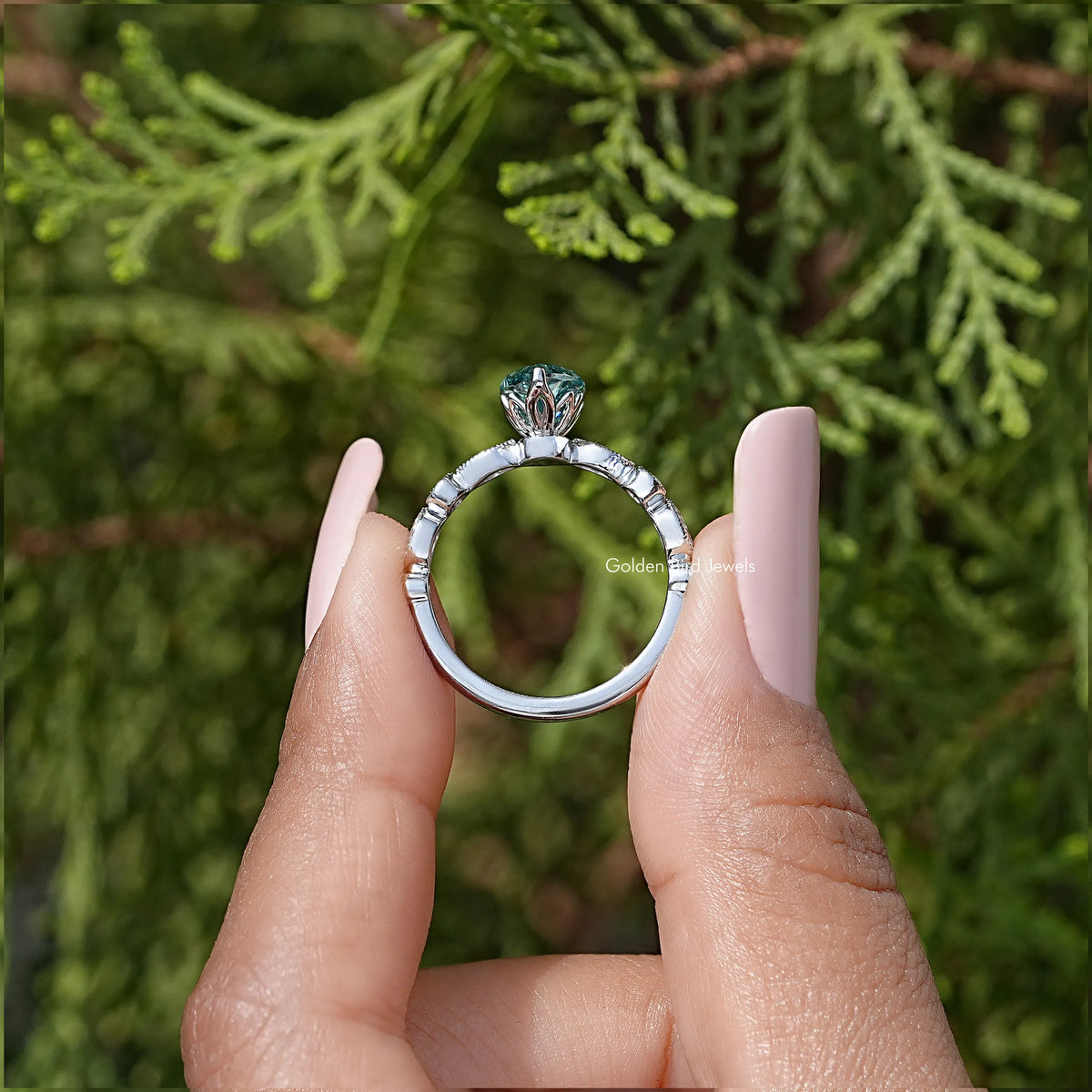 925 sterling silver ring with teal marquise center stone, shown from the back
