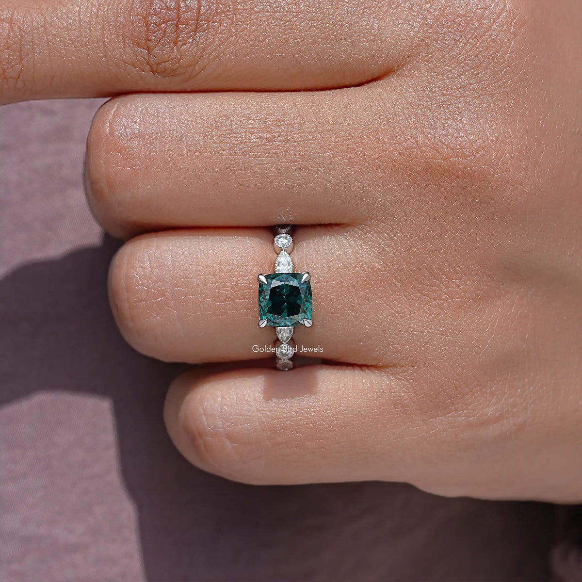 925 sterling silver moissanite engagement ring with cushion-cut teal center stone and prong-set halo