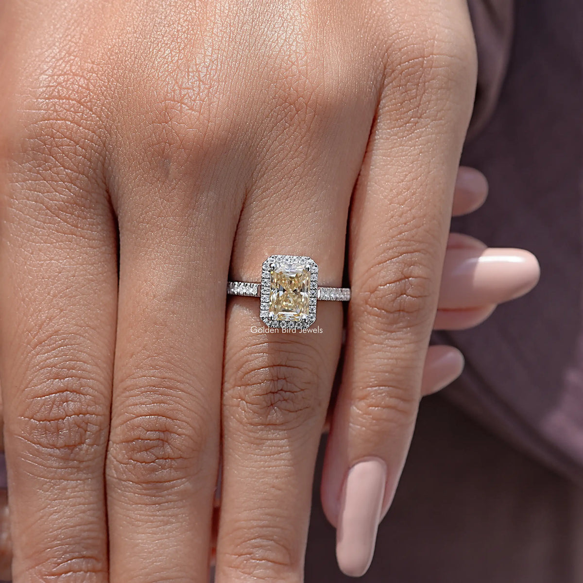 Radiant cut moissanite halo ring with pavé band
