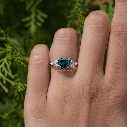 Green moissanite heart-cut ring in 925 sterling silver with sparkling side stones