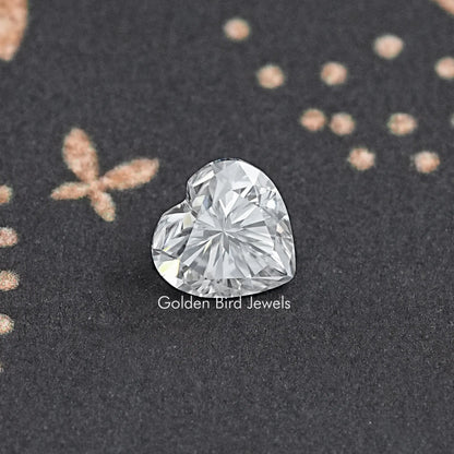 Heart-cut moissanite loose stone with brilliant facets, heart shape close-up
