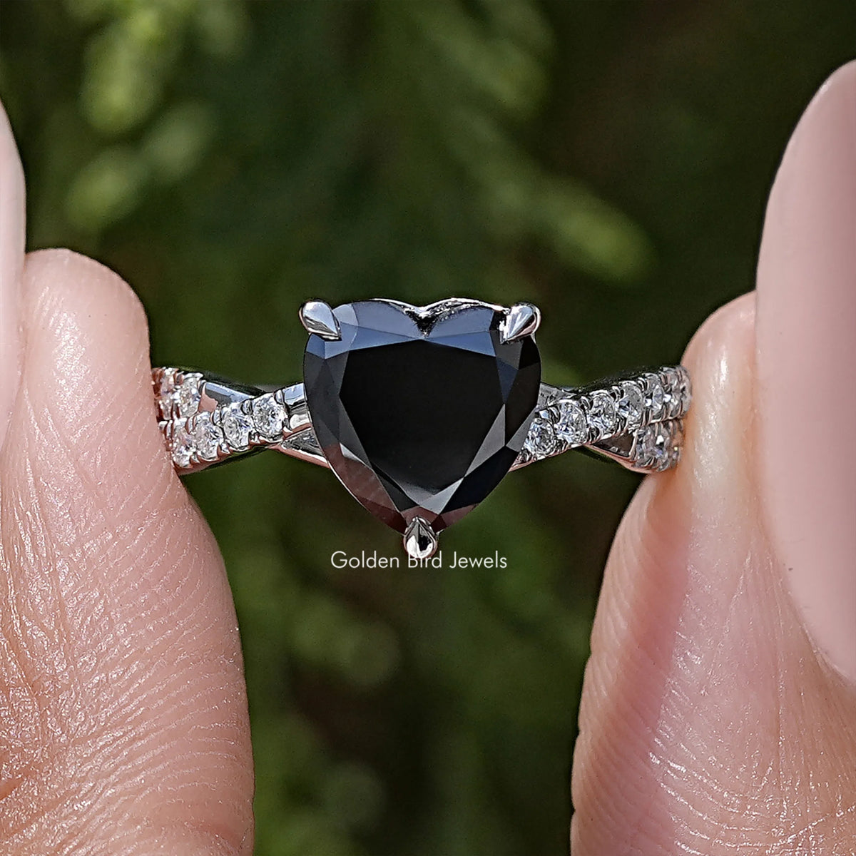 Black heart moissanite ring with twisted silver accent band