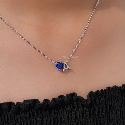 Heart gemstone pendant with letter A charm and blue stone on silver chain