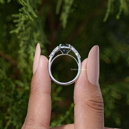 Back view of 925 sterling silver ring with green moissanite and halo setting
