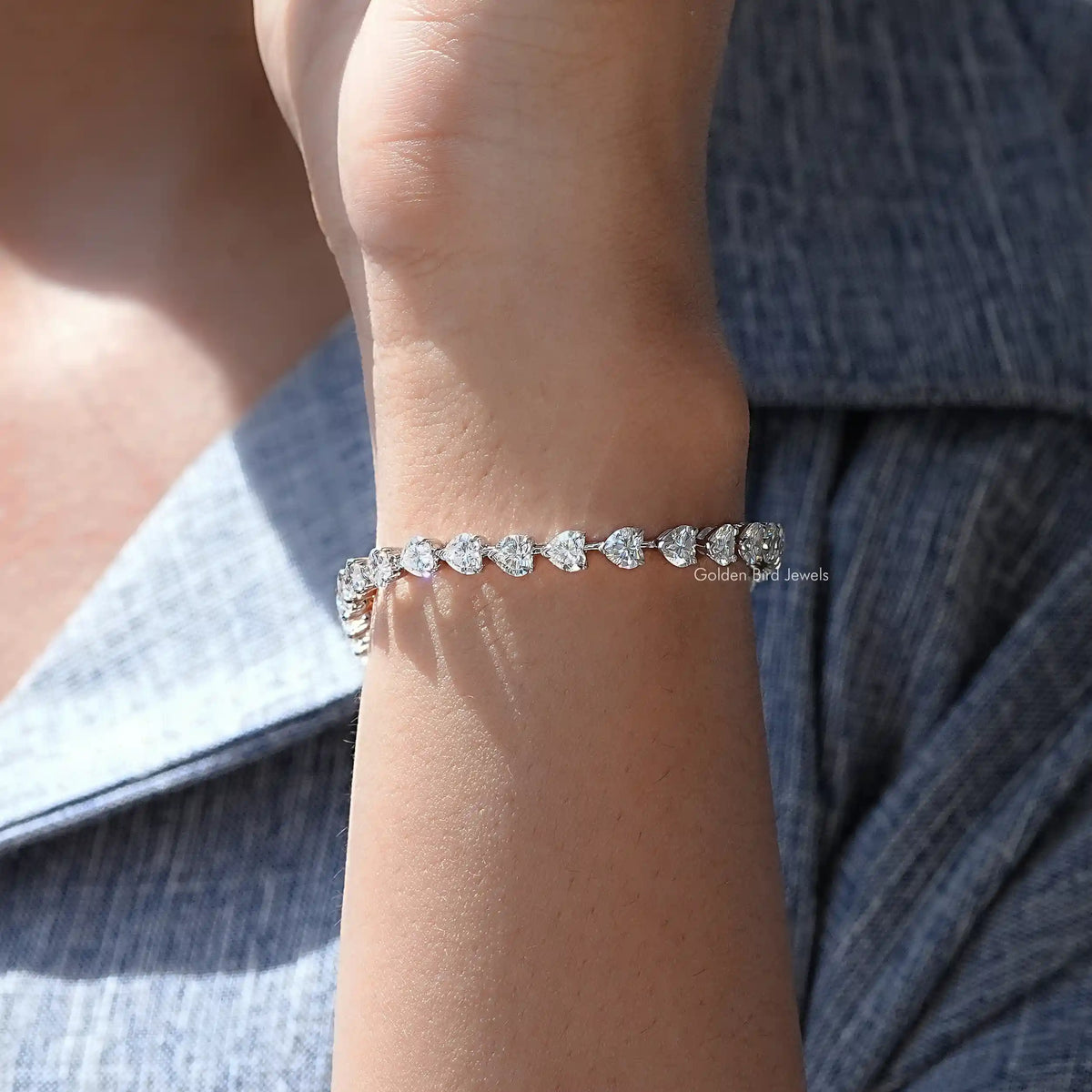 In hand showing view of moissanite  bracelet