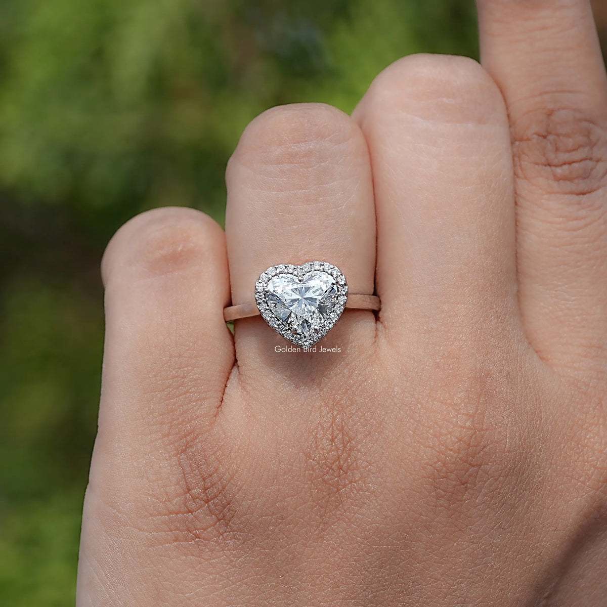 Top View Of Heart shaped diamond engagement ring 
