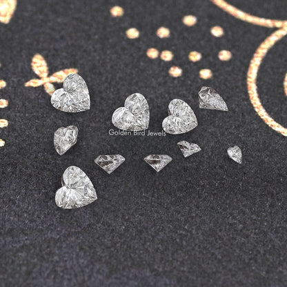Loose lab-grown heart diamond stones, assorted sizes on display felt