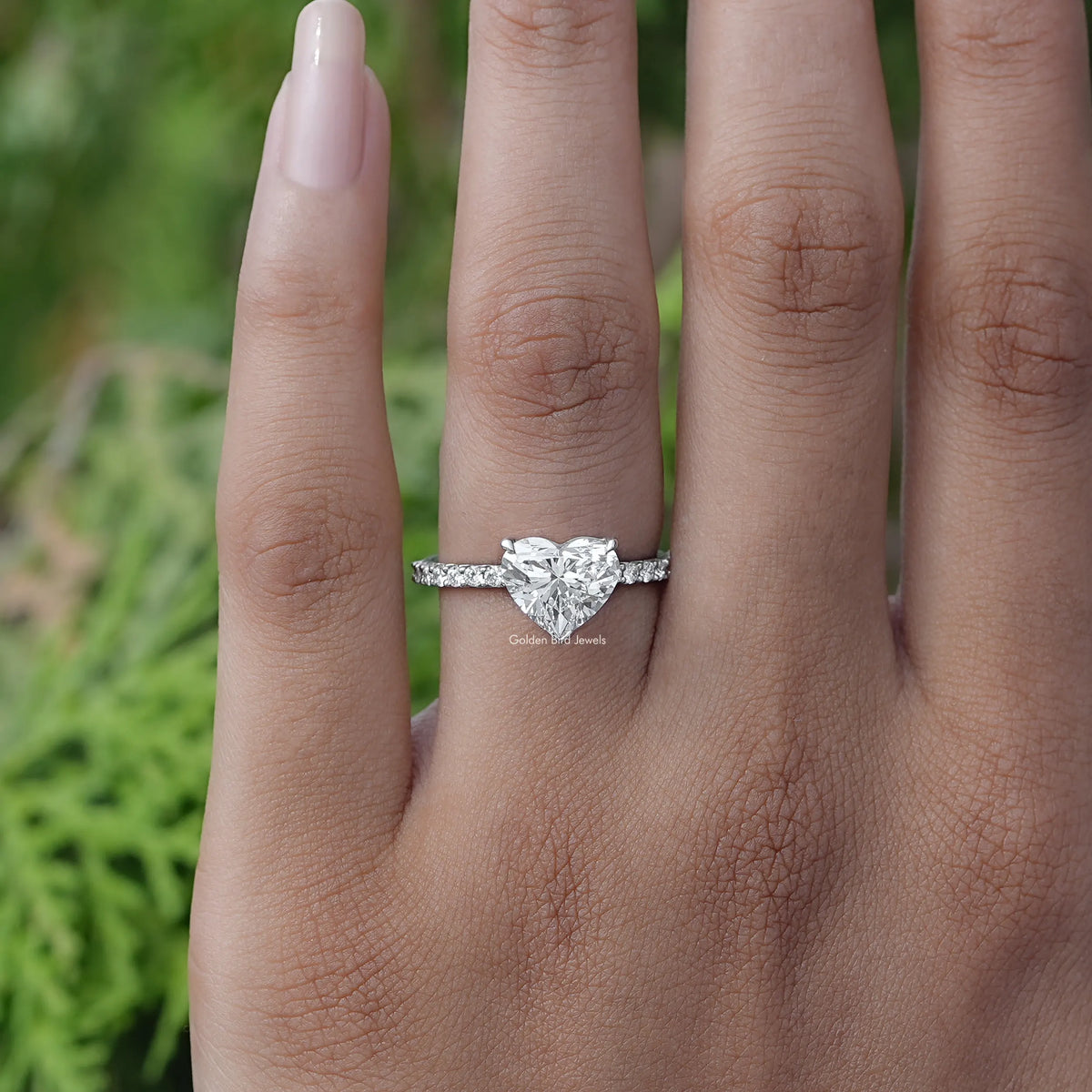 Detailed View Of Heart And Round Cut Diamond Ring In White Gold