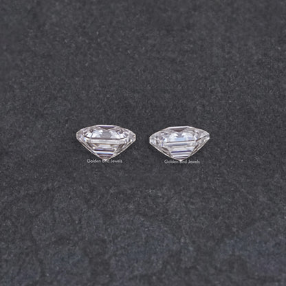 Two clear faceted moissanite stones, loose pairing