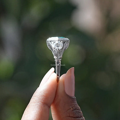 925 sterling silver three-stone engagement ring showing hexagon-cut teal center stone