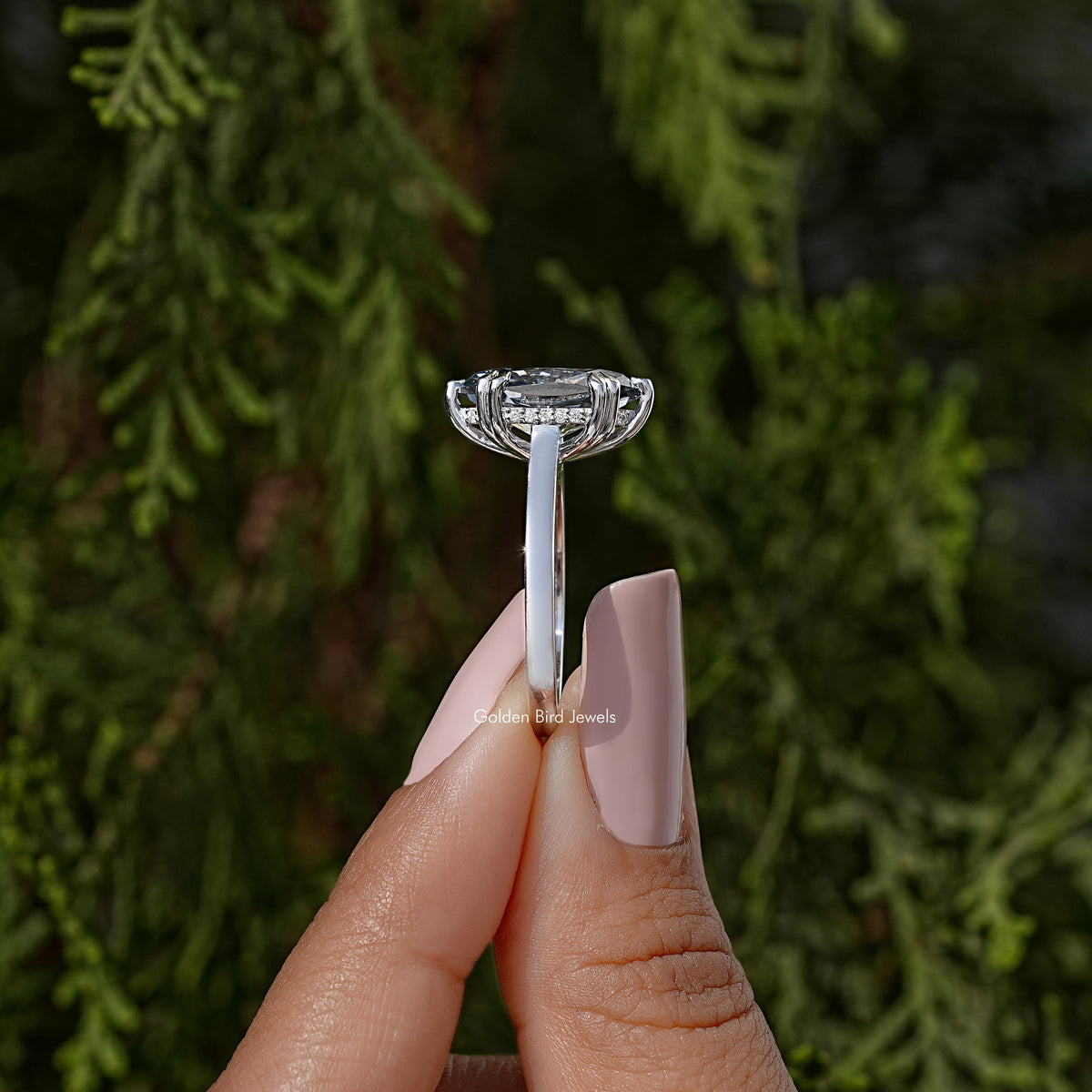 Marquise moissanite solitaire ring, detailed band with center stone facing upward